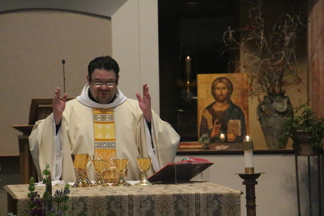 Fr. Macario Prays at the Alter